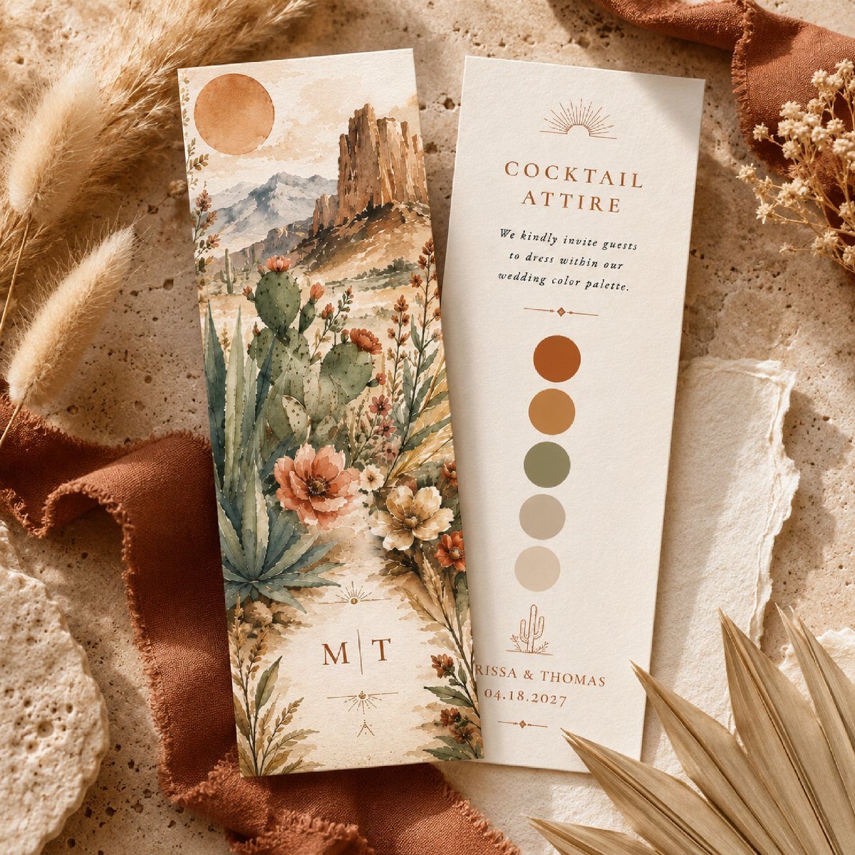 Wedding stationery cards with desert art and a rusty brown and olive color palette.