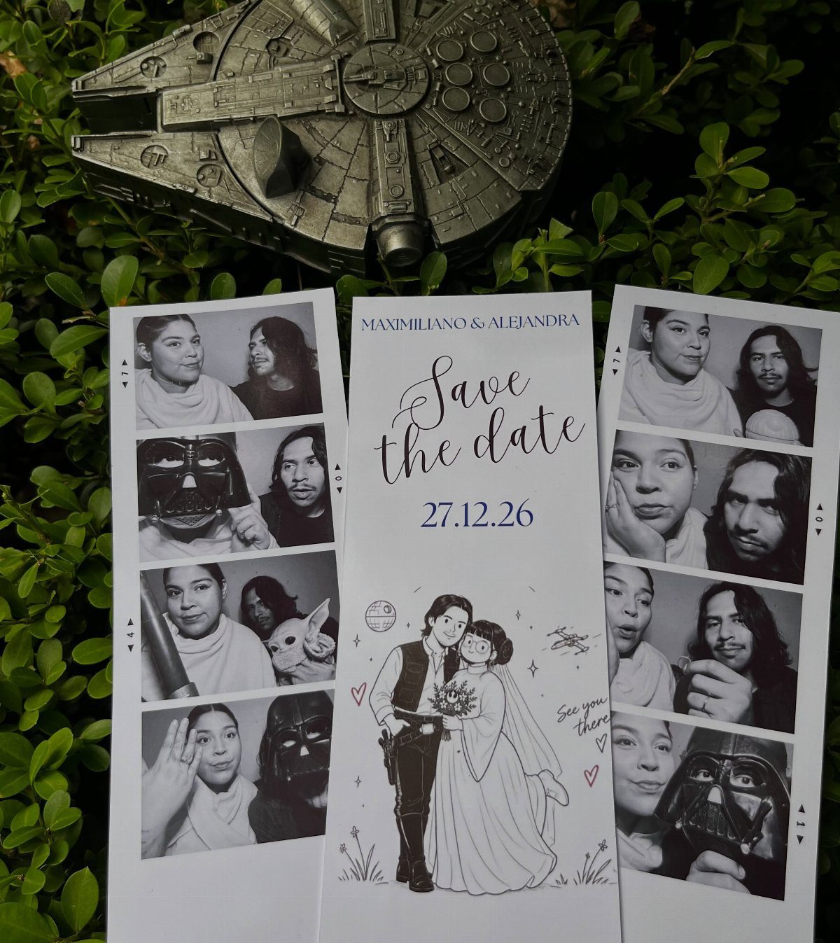 Save the date wedding card and photo strips with Millennium Falcon model on greenery